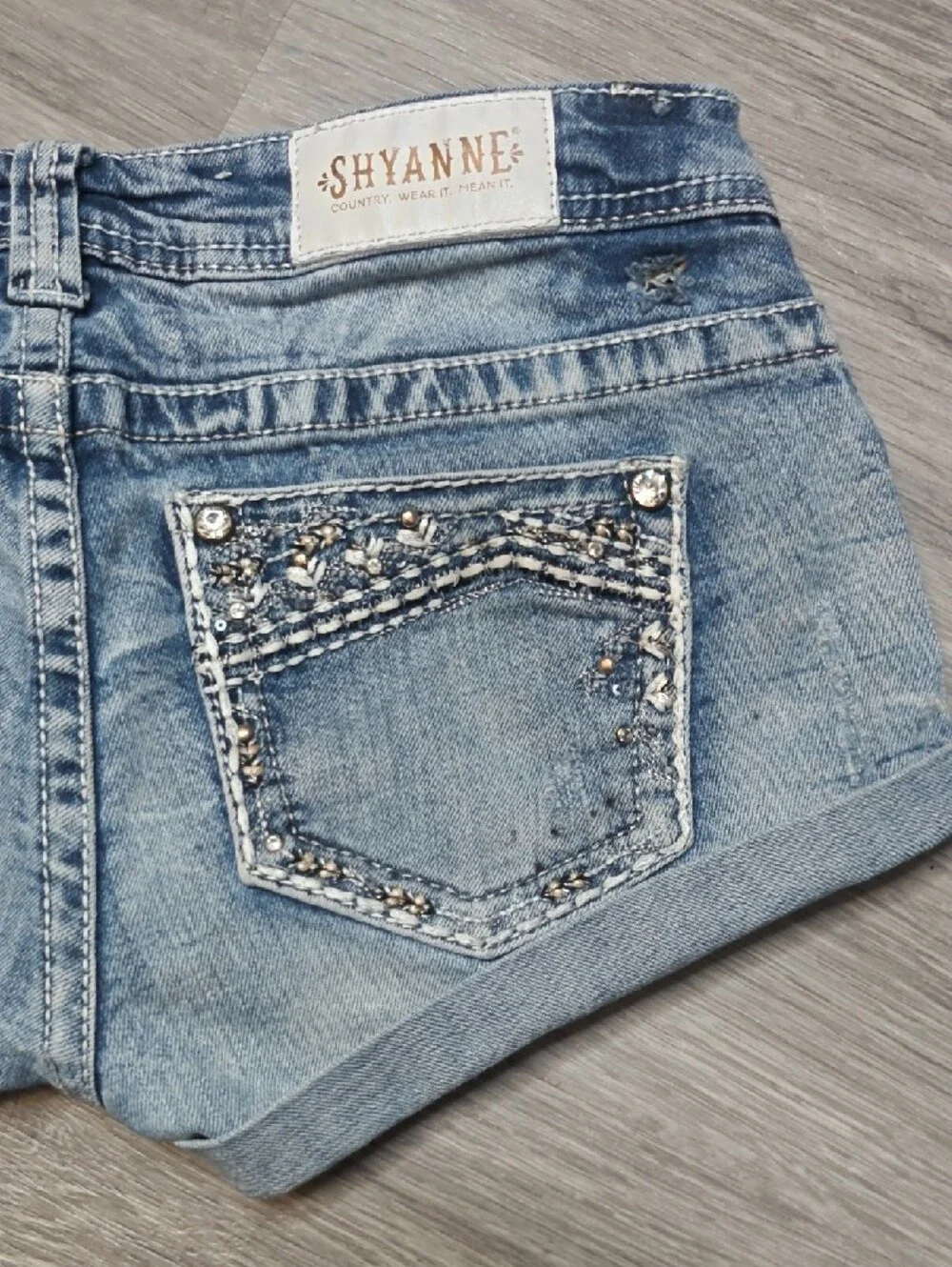Light Wash Denim Short Shorts with Embellished Pockets